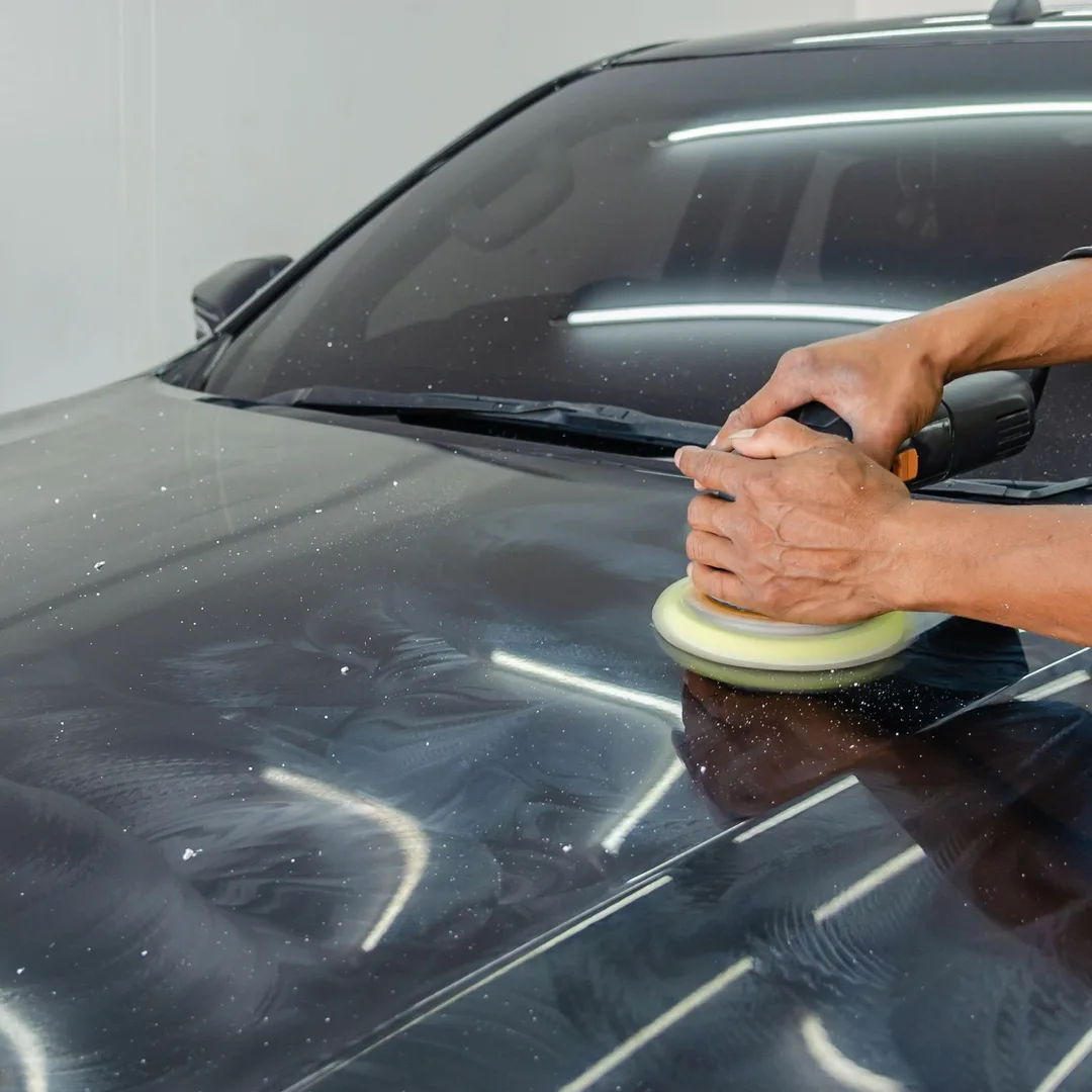 Car being detailed by hand